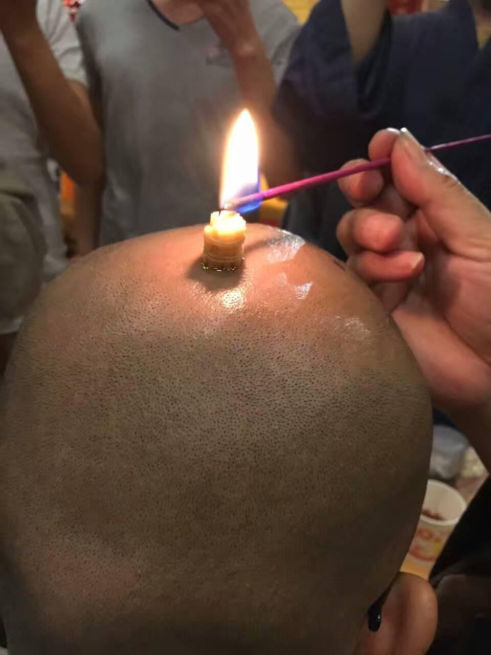 和尚出家为什么要在头上点六个有规律的点