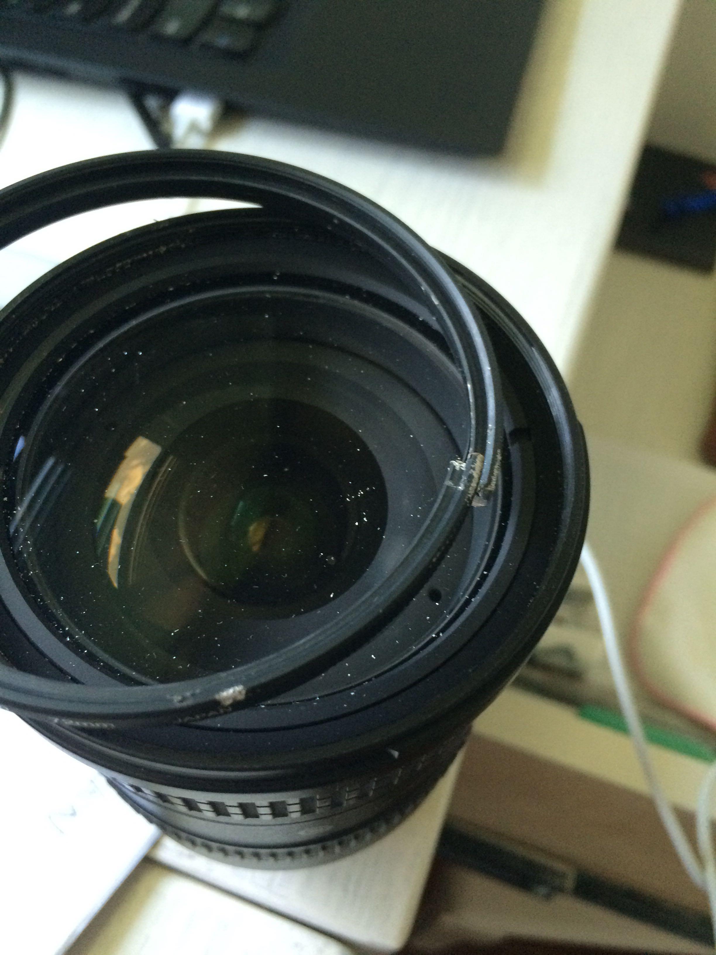 nikond90原配镜头装上uv镜后uv镜不小心被砸碎了uv镜框取不下来怎么办