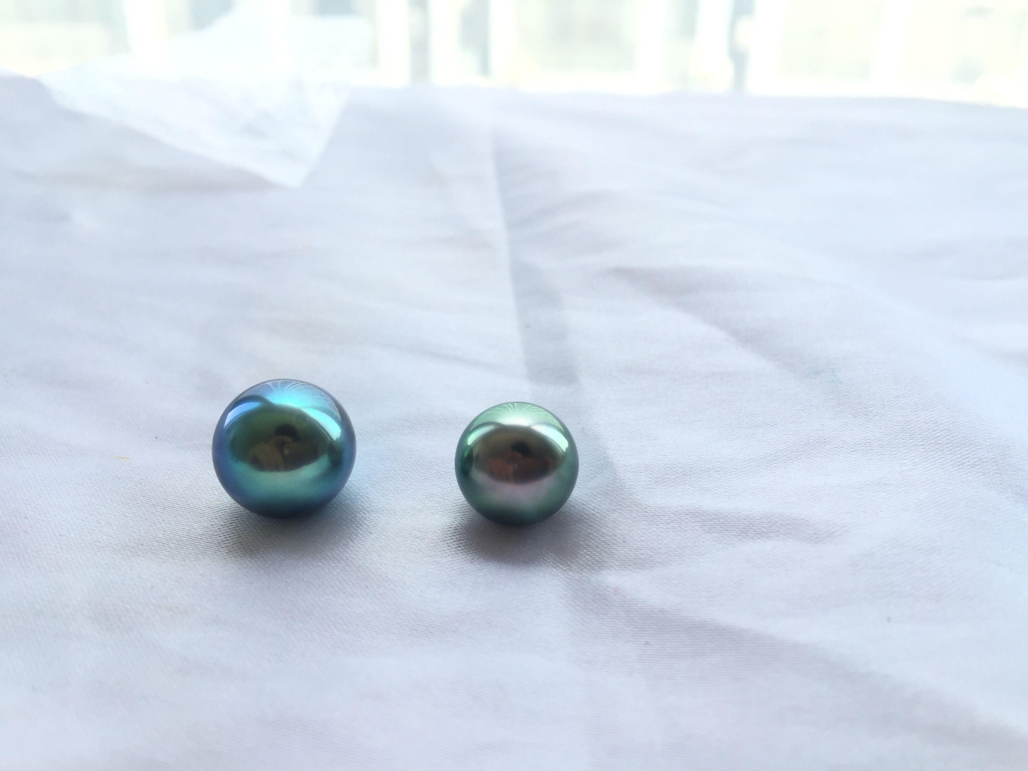 朋友送我一颗南海珍珠直径15厘米以上品质应该很好他自己去原产地挑的