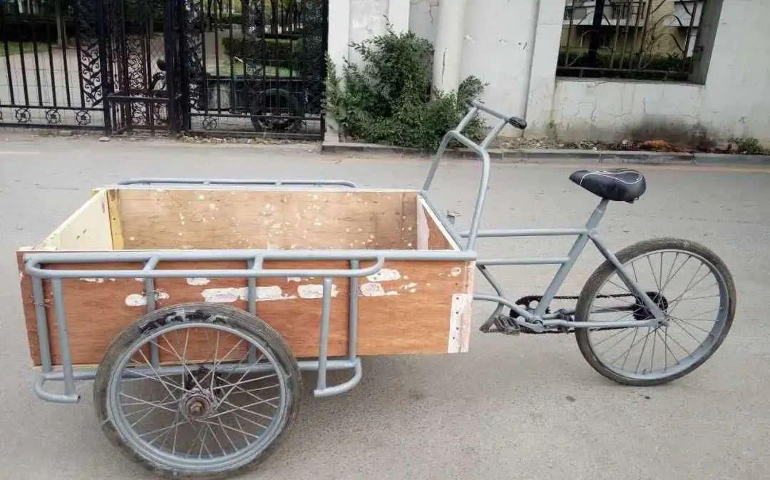 为什么东北的三轮车是倒着骑的? - 知乎