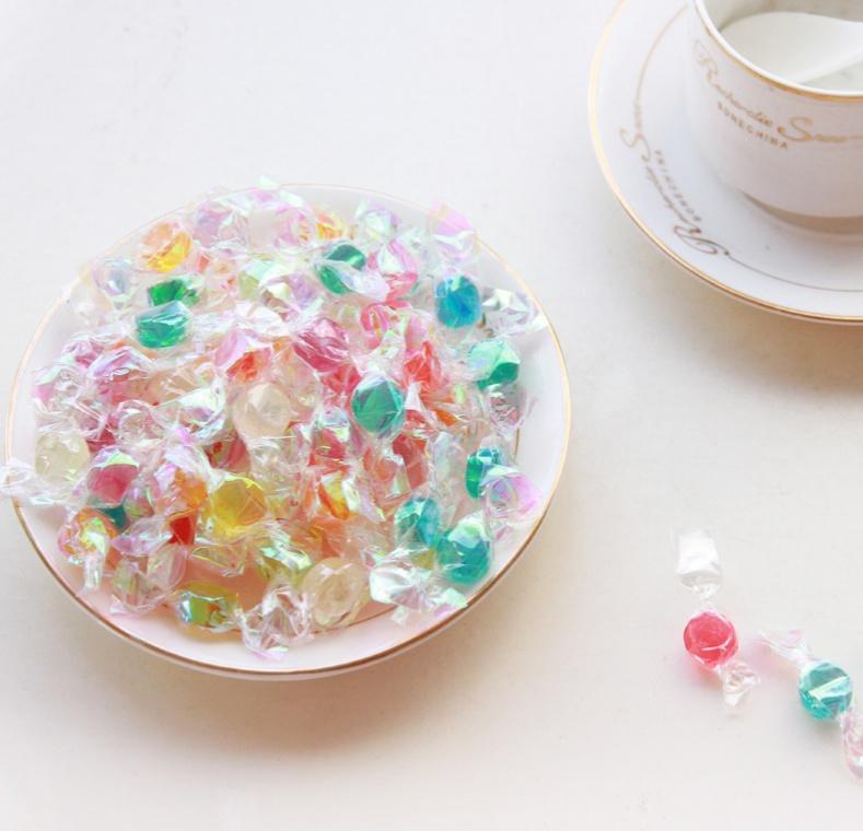 小时候吃的一种糖的糖纸彩色透明的塑料质感有人知道这纸叫什么吗