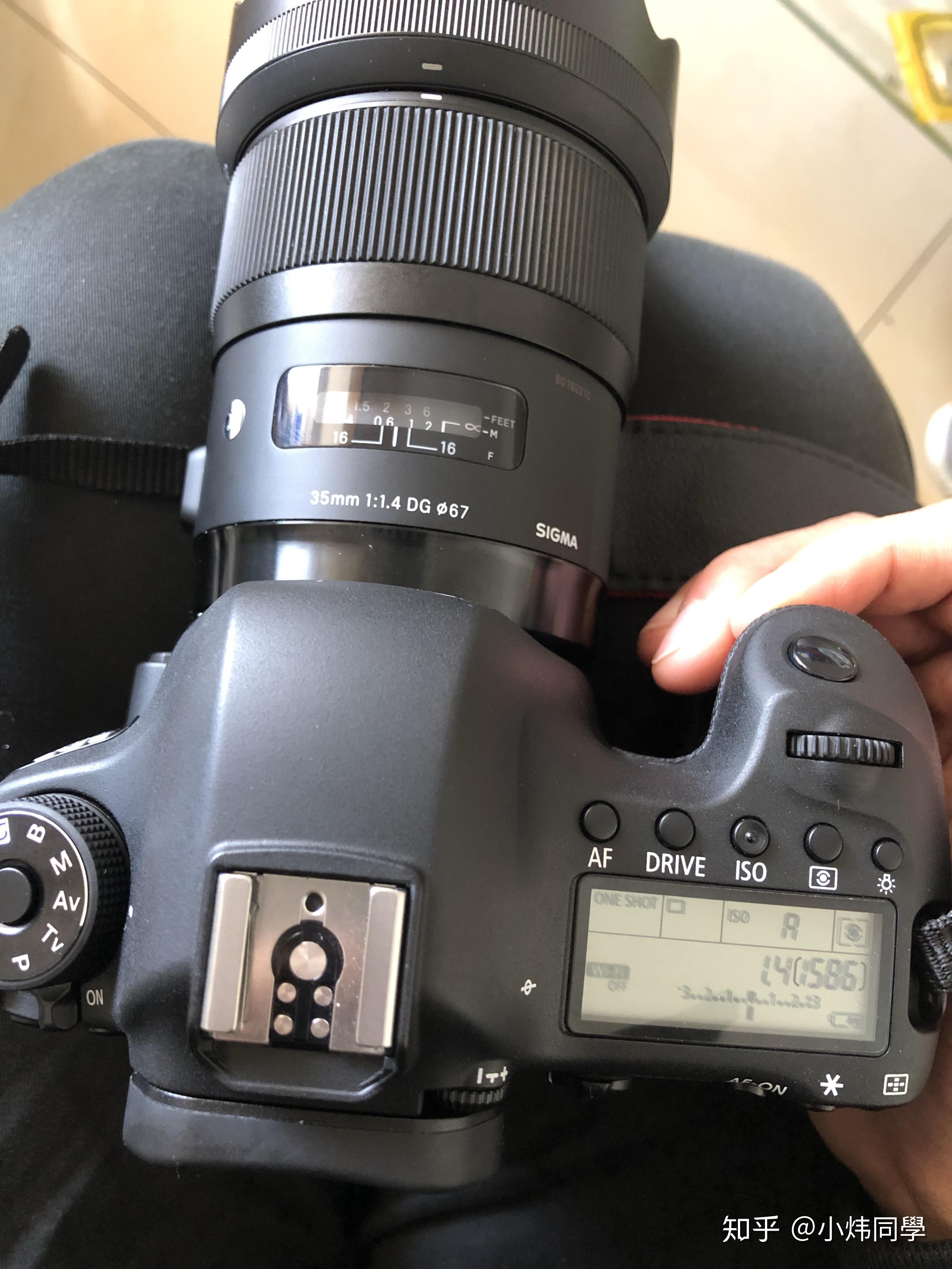 佳能5018三代和二手适马5014一代买哪个