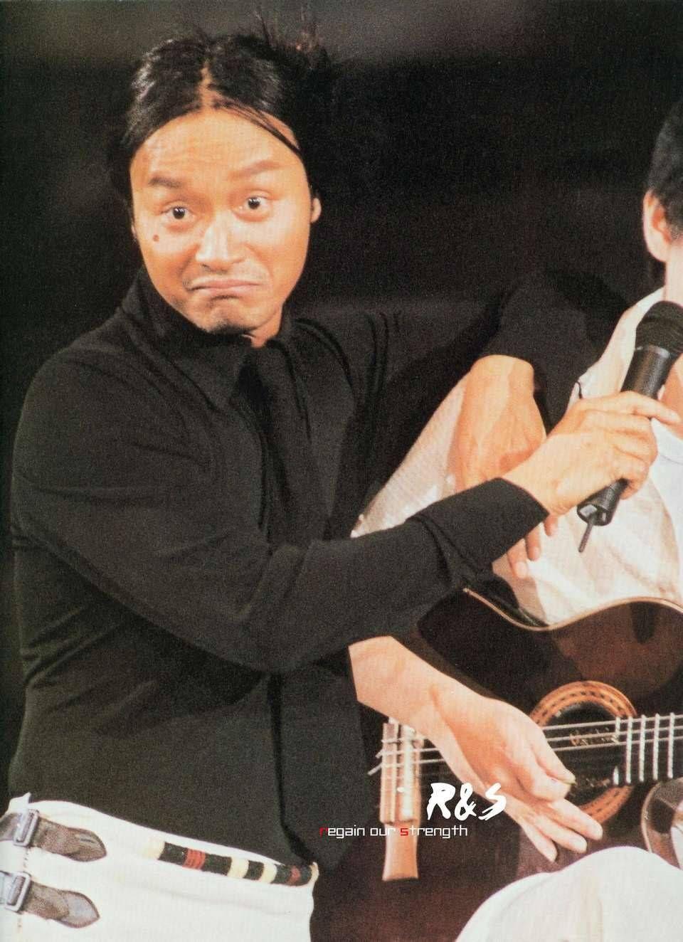 怎样评价张国荣热61情演唱会