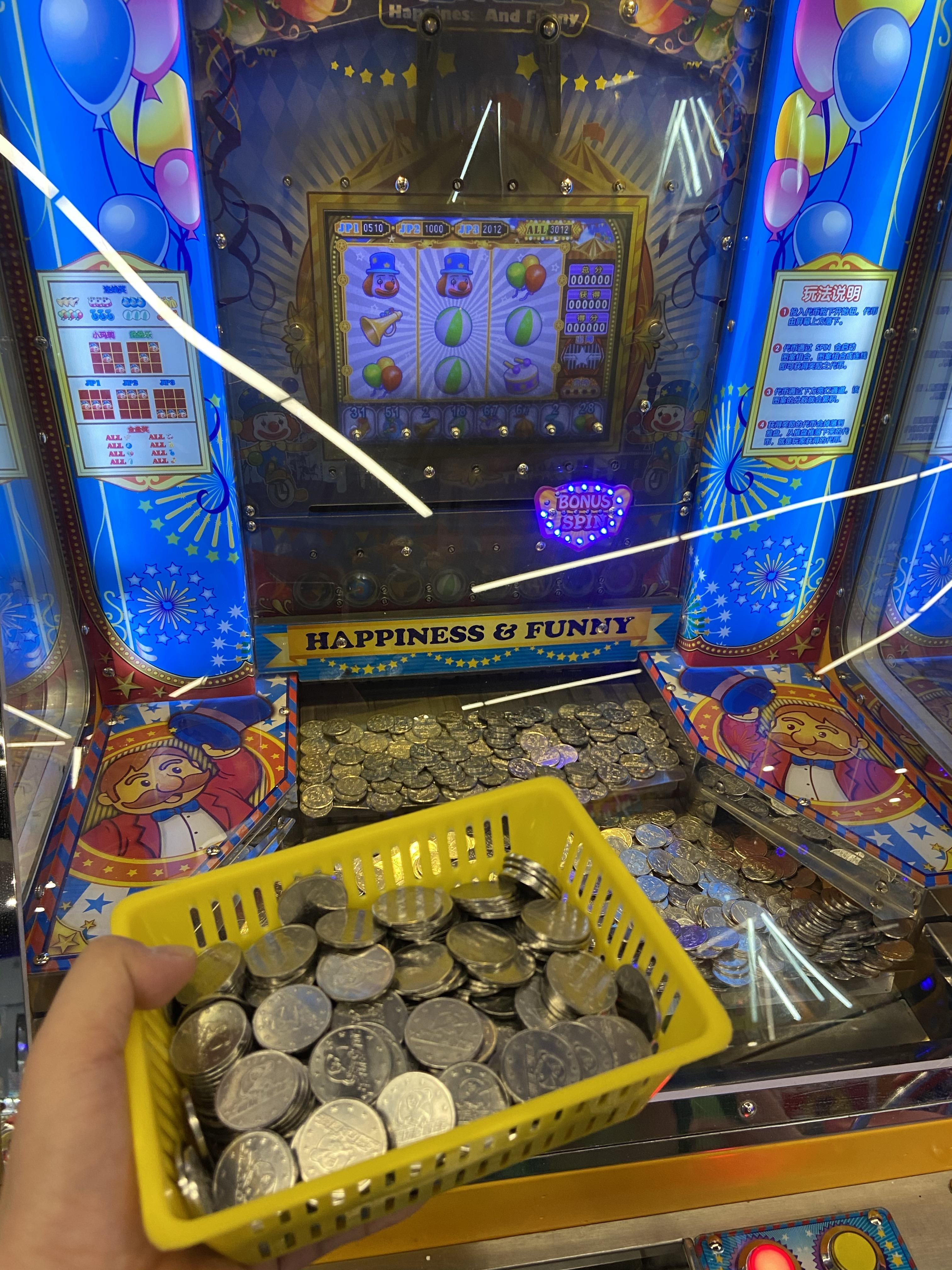 游戏厅中的推币机有何技巧