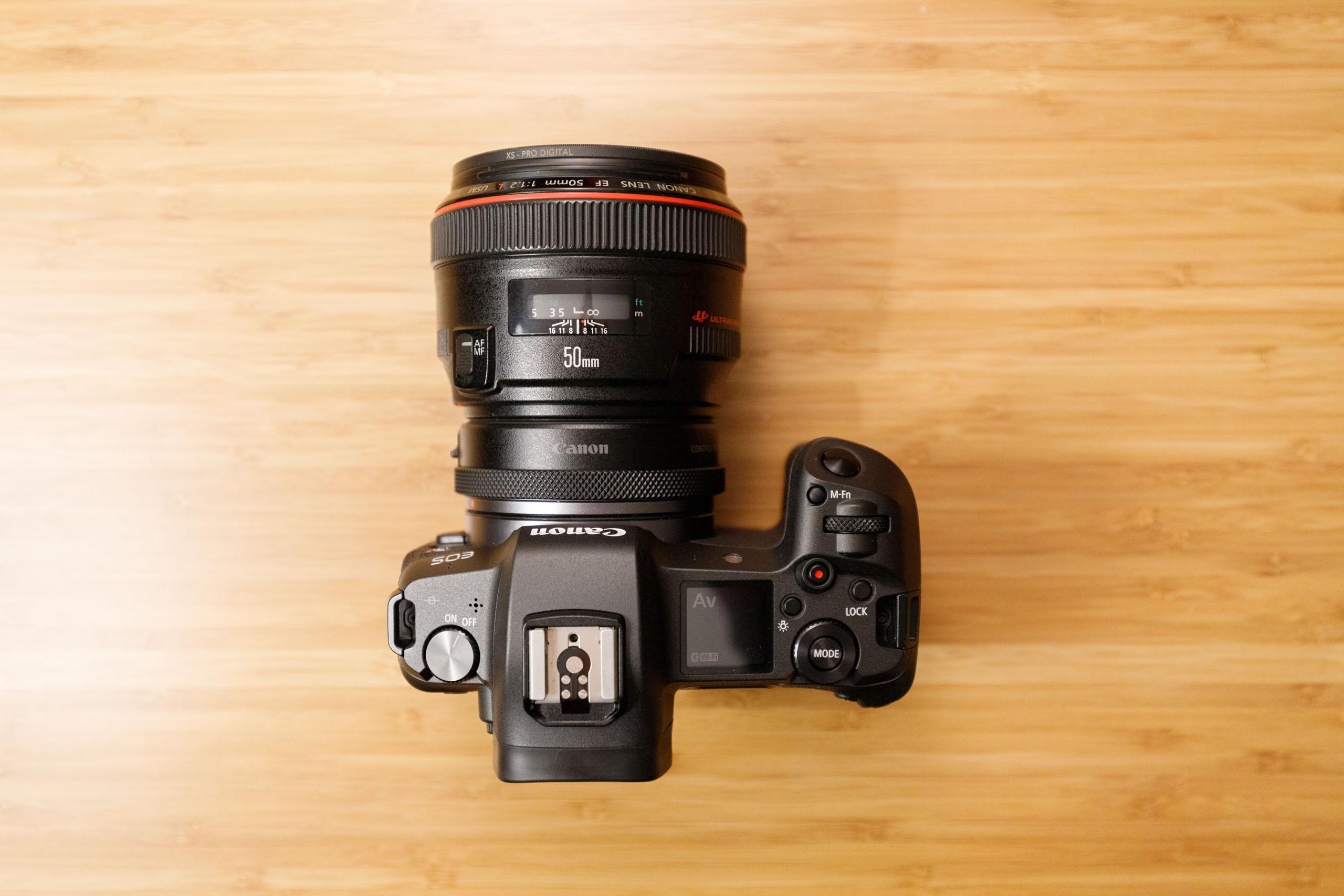 我有不少佳能单反时代不少ef镜头,现在想入手微单,我该选择r6还是a7m4