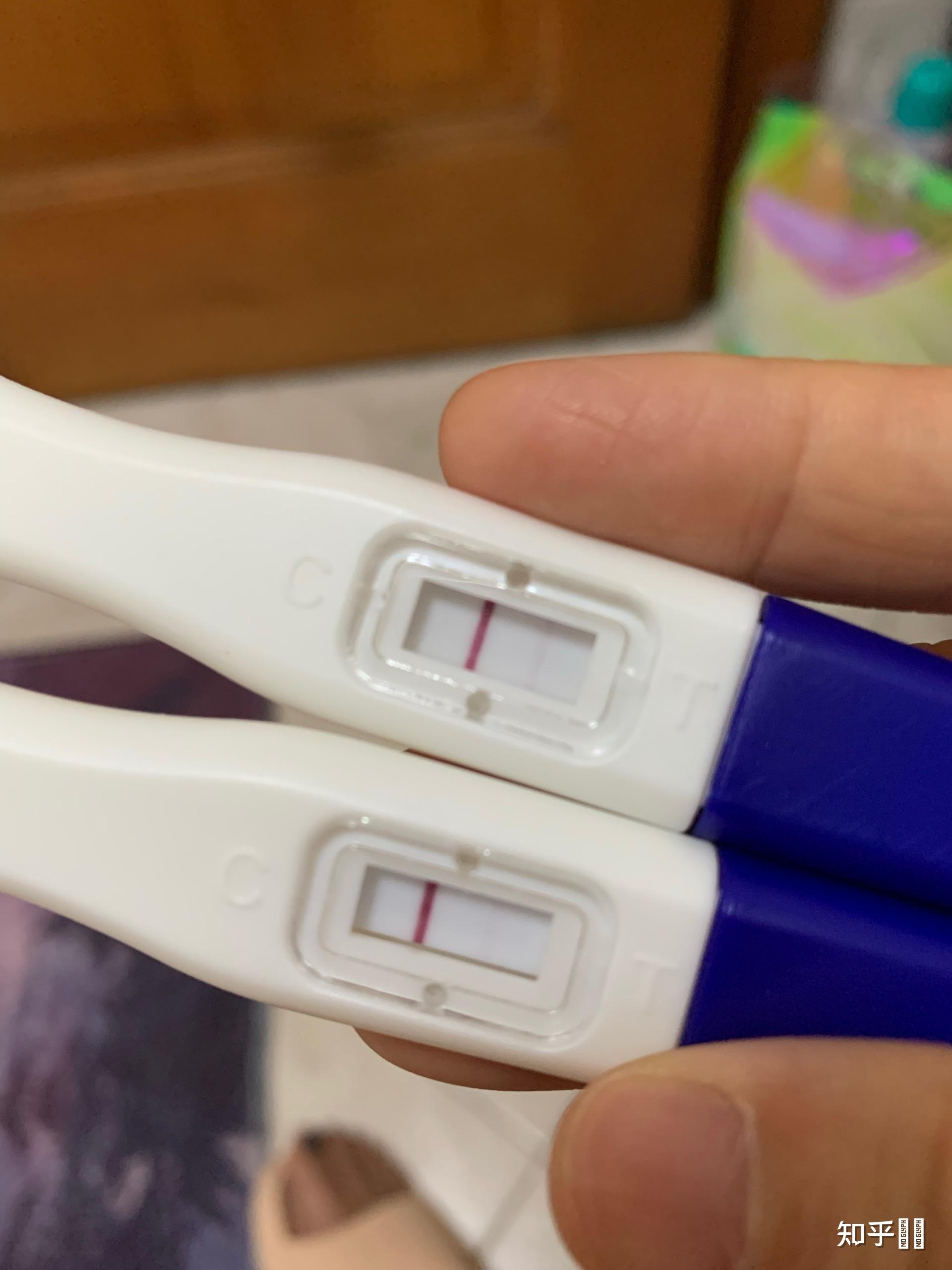 求问……验孕棒一深一浅啥意思? - 知乎